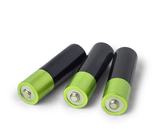 Batterij groene drie geïsoleerd op witte achtergrond — Stockfoto