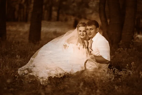 Retro black and white photo of sepia beautiful couple at wedding — Stock Photo, Image
