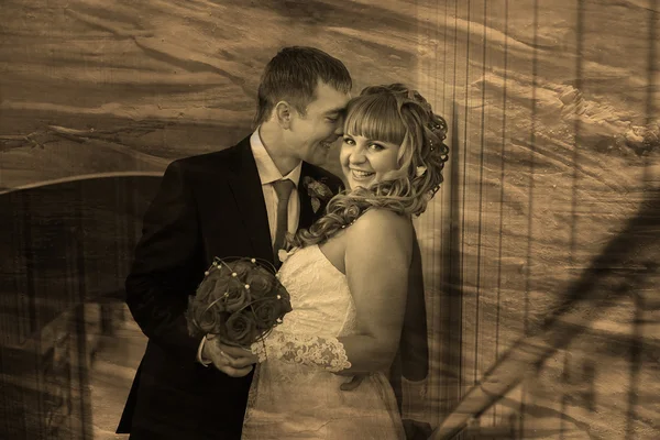 Retro sepia black and white photo bride and groom smiling in a r — Stock Photo, Image