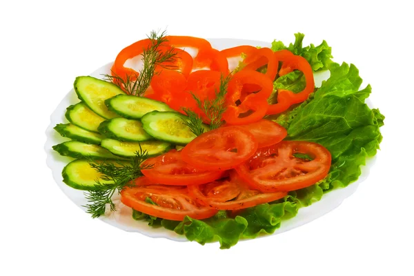 Cucumbers tomatoes tasty sliced salad plate isolated on white ba — Stock Photo, Image