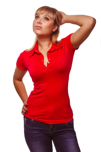 Mujer rubia mirando hacia arriba pensando chaleco rojo y jean —  Fotos de Stock