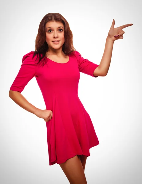 Surprised woman shows finger in the direction of a hand — Stock Photo, Image