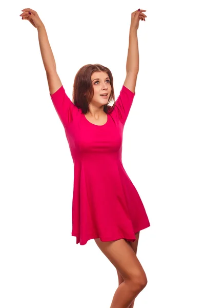 Happy woman raised hands up happy success look in a pink dress i — Stock Photo, Image