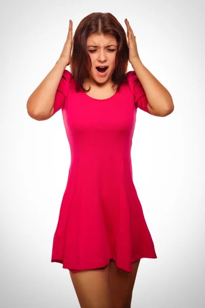 Brunette woman covering her ears with hands screaming opened — Stock Photo, Image