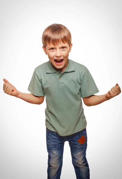 Teen happy excited teenage boy shows his hand so fists backg — Stock Photo, Image