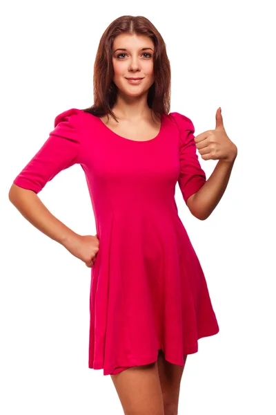 Woman young sign thumbs yes in pink dress isolated — Stock Photo, Image