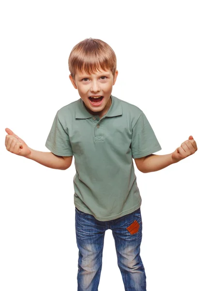 Teen happy excited teenage boy shows his hand so his fists — Stock Photo, Image