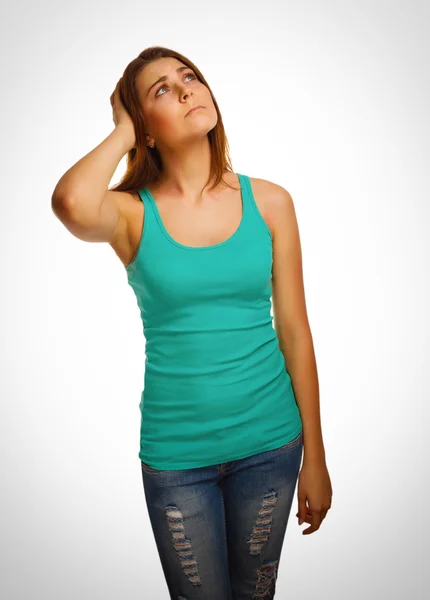 Girl looking up frowning woman thinks — Stock Photo, Image