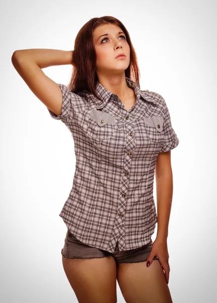 Woman brunette girl shows positive sign thumbs yes, shirt shorts — Stock Photo, Image