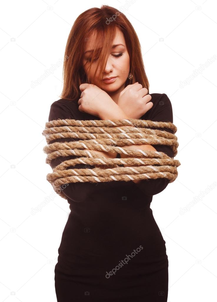 brunette hostage, captive woman bound with rope prisoner in jean