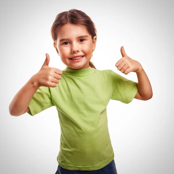 Bebé niña levantó los pulgares hacia arriba símbolo sonriente aislado indica — Foto de Stock