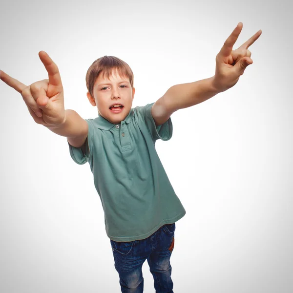 Adolescente menino mostra gesto mãos metal rock diabo isolado no wh — Fotografia de Stock