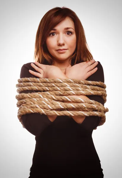 Woman prisoner tied rope hostage female bondage bound girl slave — Stock Photo, Image