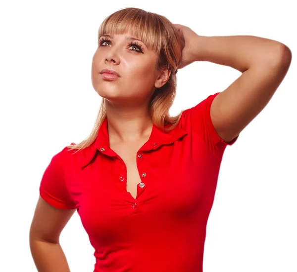 Blonde woman looking up thinking red vest and jean — Stock Photo, Image