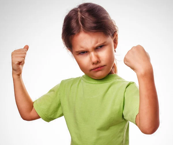 Angry evil girl shows fists experiencing anger and emotion — Stock Photo, Image