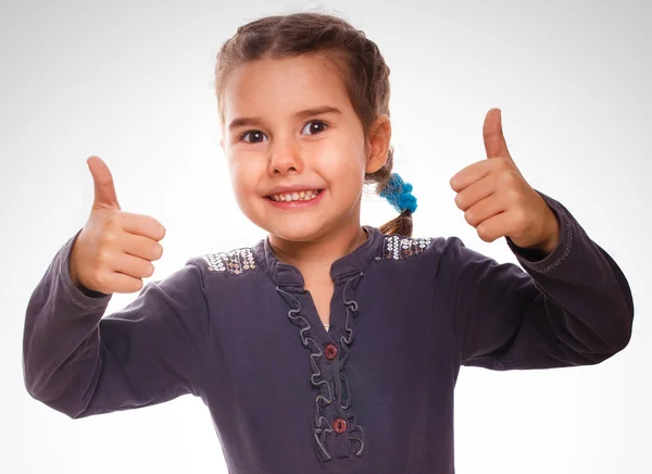 Ragazza bambino alzato i pollici verso l'alto isolato simbolo sorridente indica — Foto Stock