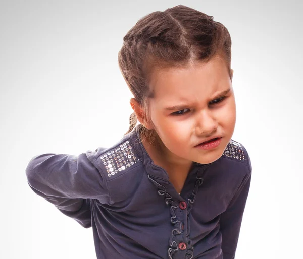 Osteocondrosi bambino adolescente che tiene una mano dietro la schiena p — Foto Stock