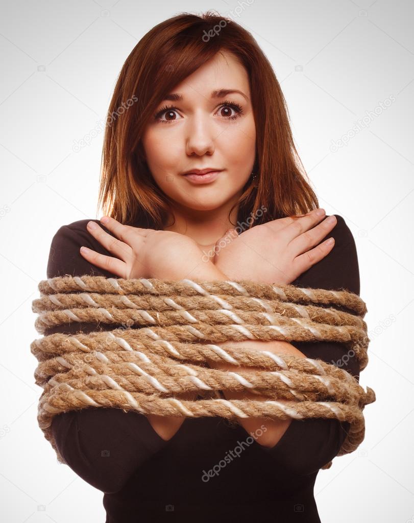 Woman prisoner tied rope hostage female bondage bound girl slave