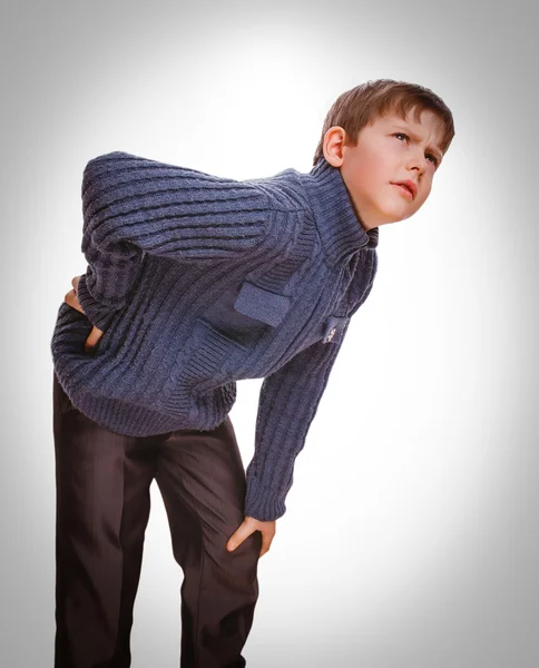 Grå osteochondrosis teenage innehar tonåring handen pojke bakom — Stockfoto