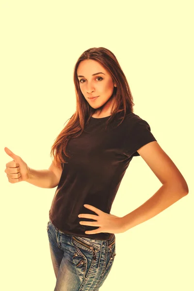 Happy young woman girl shows positive sign thumbs yes, in gray T — Stock Photo, Image