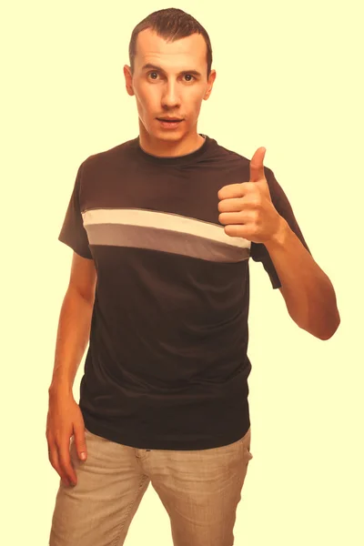Mannelijke volwassen brunette man toont teken gebaar met beide handen zo is — Stockfoto