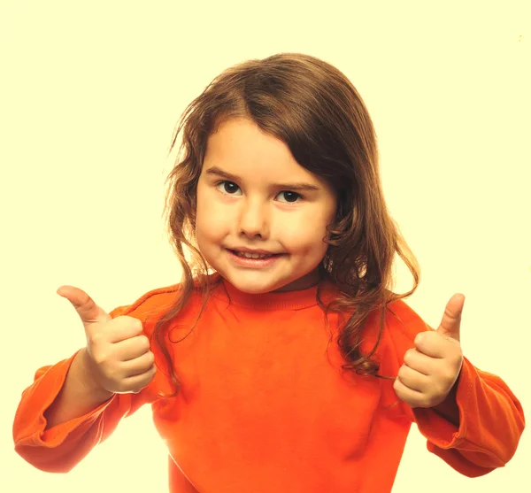 Curly brunette girl holding child shows thumb yes agreement isol — Stock Photo, Image