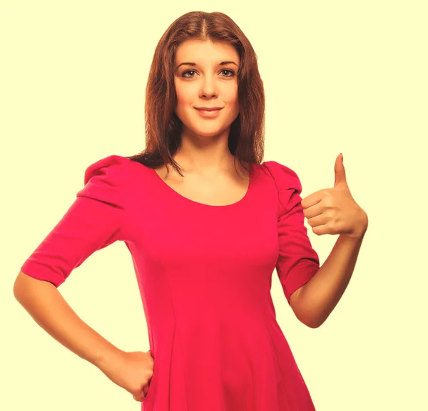 Girl woman young positive sign thumbs yes in pink dress isolated — Stock Photo, Image