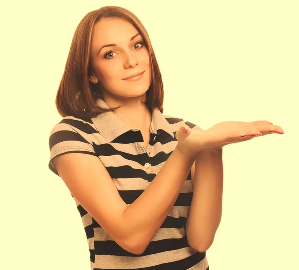 Happy girl brown hair young portrait woman showing open hand hol — Stock Photo, Image