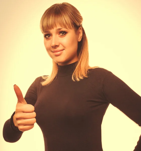 Portrait happy woman young girl shows positive sign thumbs yes, — Stock Photo, Image