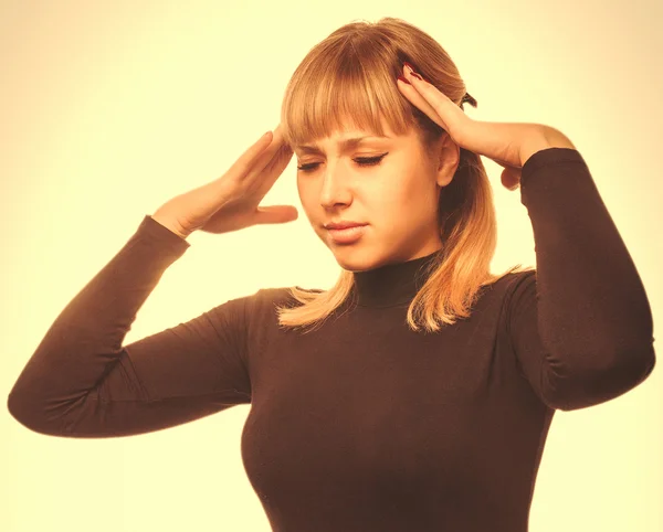 Portrait tired young woman in pain and stress headache, holding — Stock Photo, Image