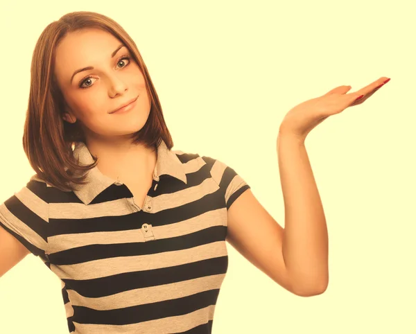 Portrait woman happy young  showing open hand holding in isolate — Stock Photo, Image