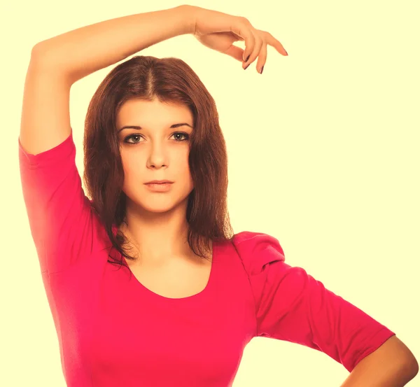 Woman brunette girl in a pink dress isolated on white background — Stock Photo, Image