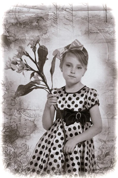 A little girl dressed in the style of the 60s — Stock Photo, Image