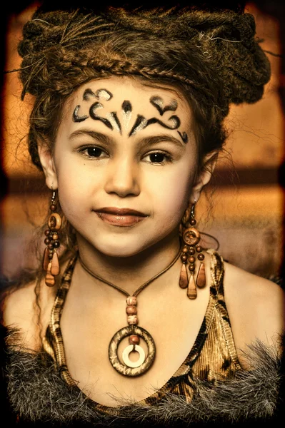 Portrait of girl in ethnic style with dreadlocks — Stock Photo, Image