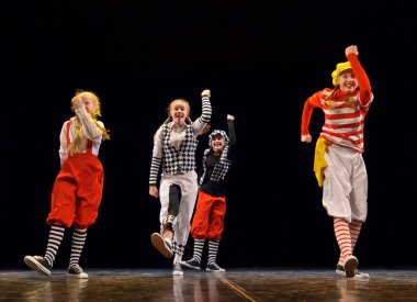 Dance performance on stage, Festival of children's dance groups, St. Petersburg, Russia. clipart