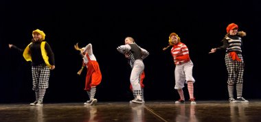 Dance performance on stage, Festival of children's dance groups, St. Petersburg, Russia. clipart