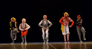 Dance performance on stage, Festival of children's dance groups, St. Petersburg, Russia. clipart