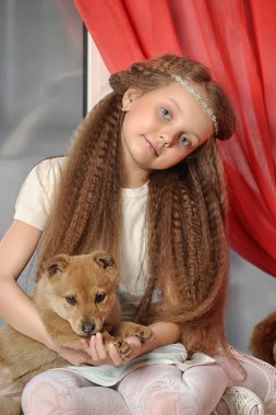 girl with a puppy clipart