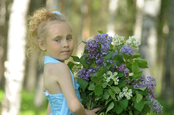 Girl with lilac — Stock Photo, Image