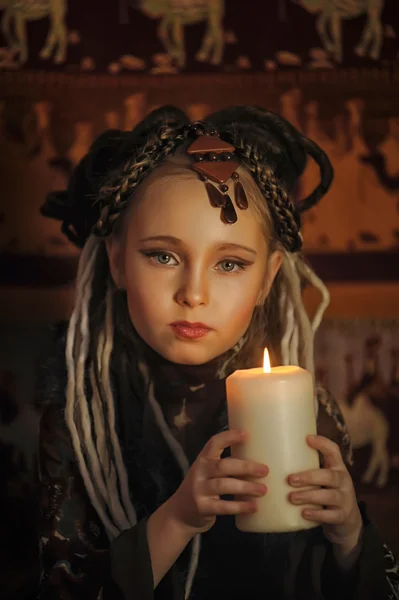 Girl with candles — Stock Photo, Image