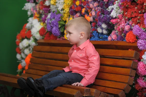 Boy on a bench — Stock Photo, Image
