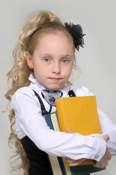 Menina da escola com livros — Fotografia de Stock