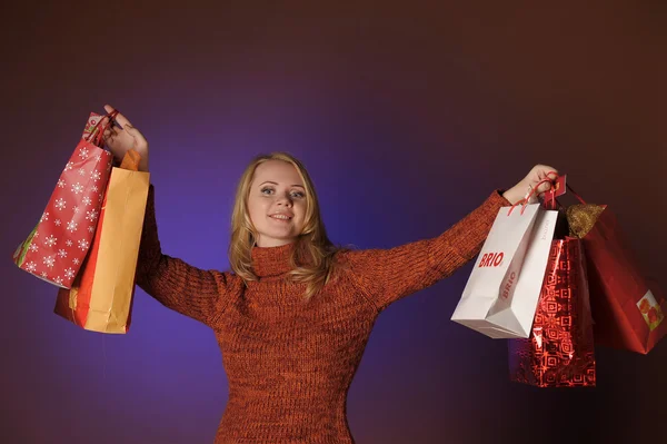 Mulher com sacos de compras — Fotografia de Stock