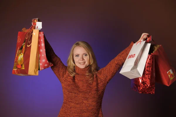 Mulher com sacos de compras — Fotografia de Stock