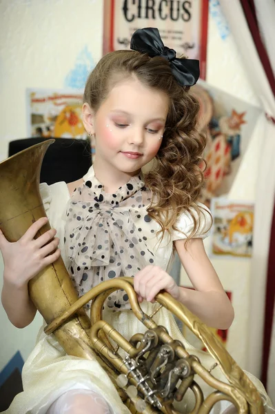 Portrait of a little circus actress with tuba — Stock Photo, Image
