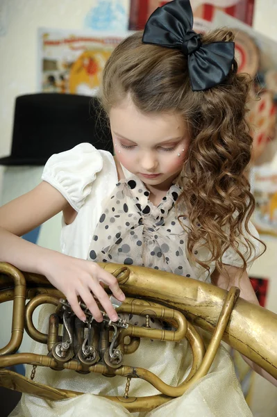 Portrait of a little circus actress with tuba — Stock Photo, Image