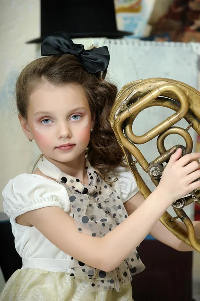 Portrait of a little circus actress with tuba — Stock Photo, Image