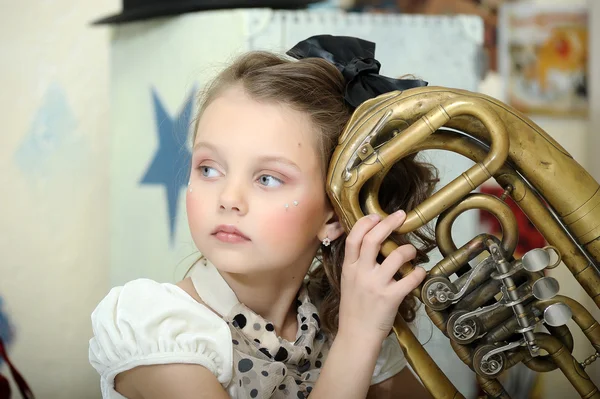 Portrait of a little circus actress with tuba — Stock Photo, Image