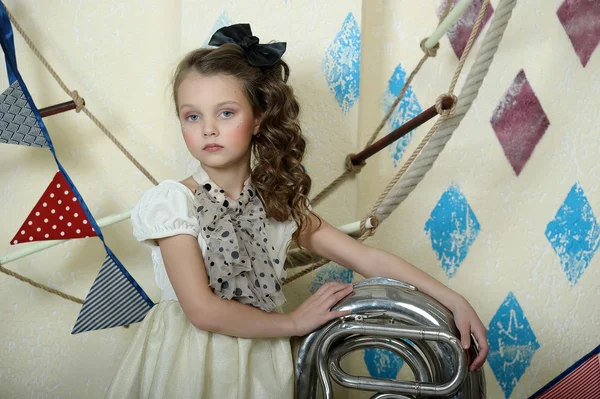 Portrait of a little circus actress with tuba — Stock Photo, Image