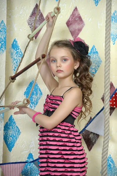 Portrait of a little circus actress with tuba — Stock Photo, Image